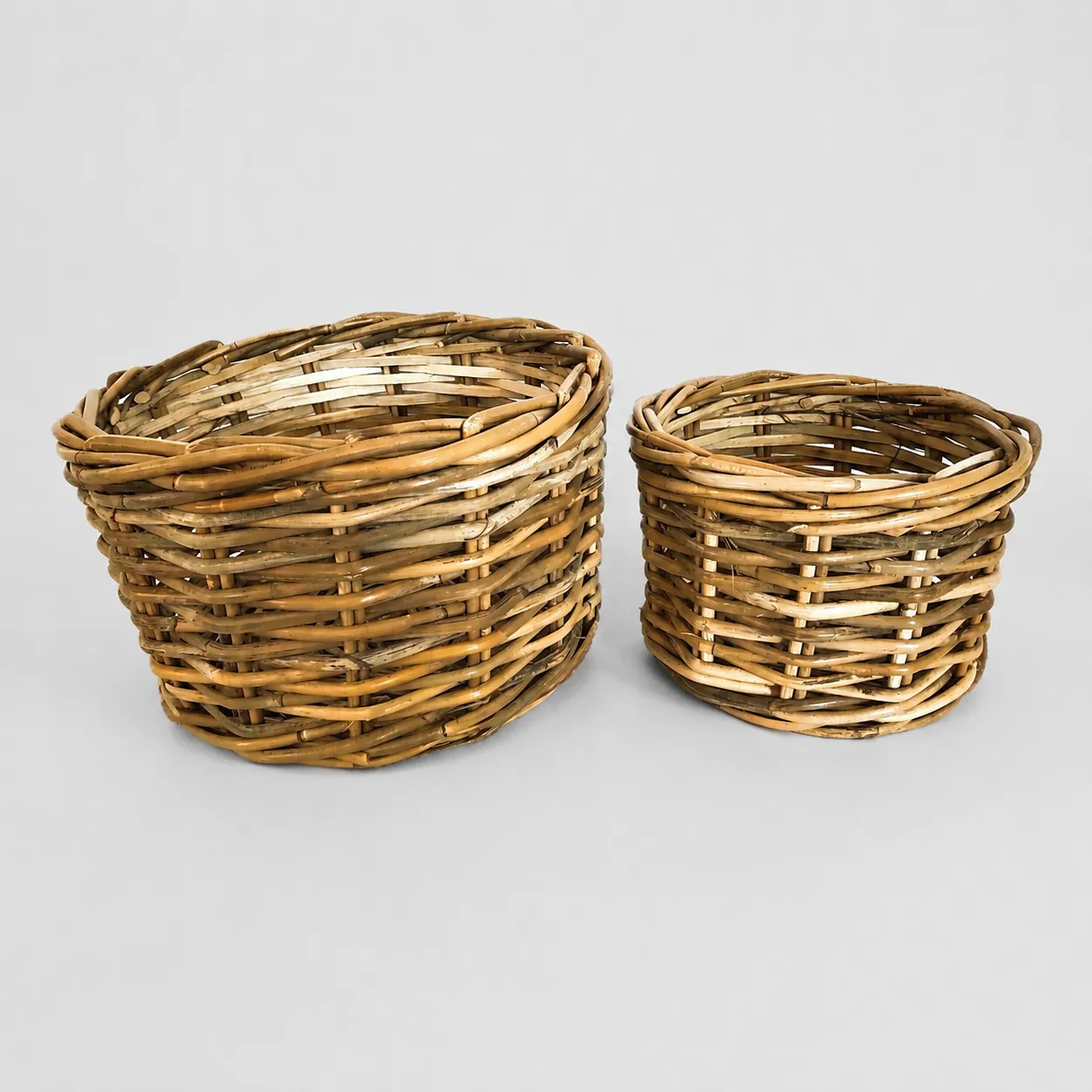 Two round woven baskets